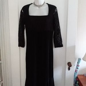 NW/OT Slinky brand black square neck dress with 3/4 length lace sleeves. Size XS